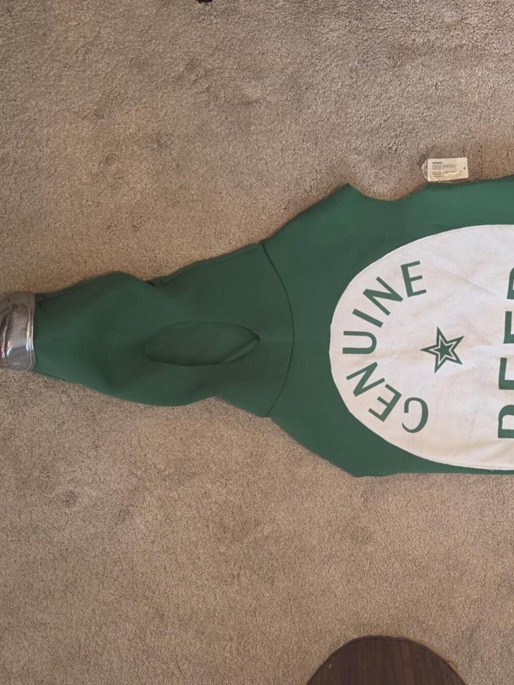 Kmart green beer bottle costume with Kmart tag attached